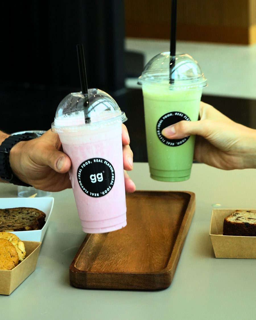 Two milkshakes cheersing