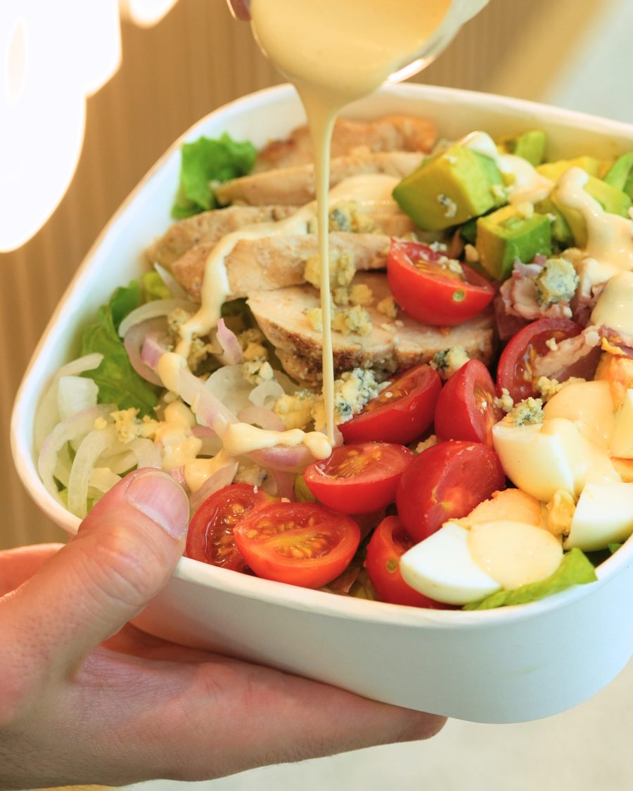 Cobb salad dressing pour